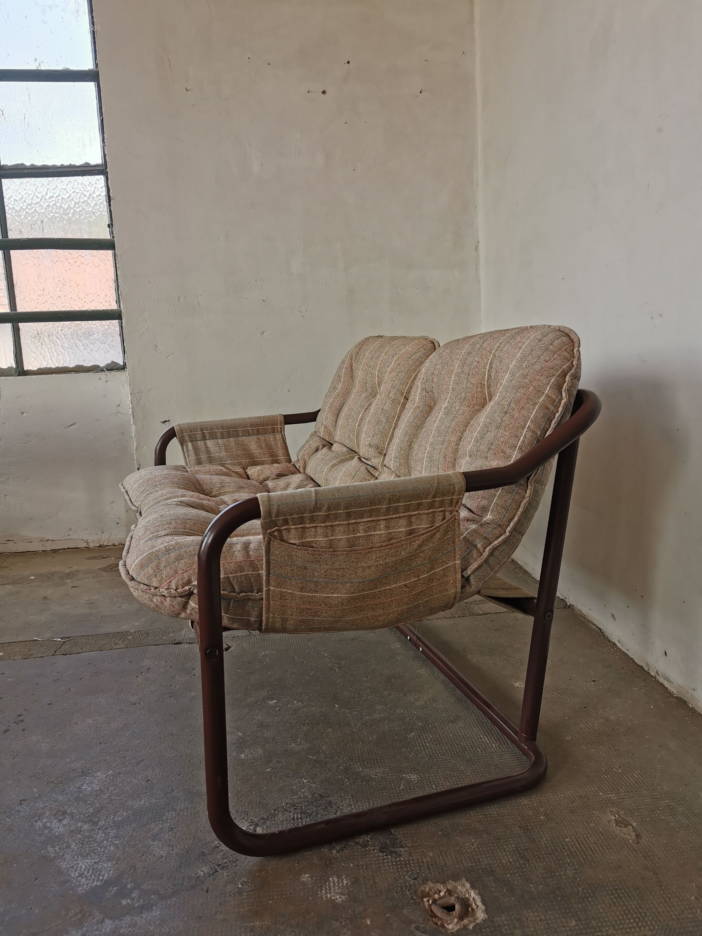 Tubular metal bench from the 80s