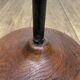 Brass ashtray on metal stand and wooden base