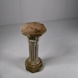Socle en pierre composite. XXe siècle