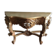 Console en bois patiné doré