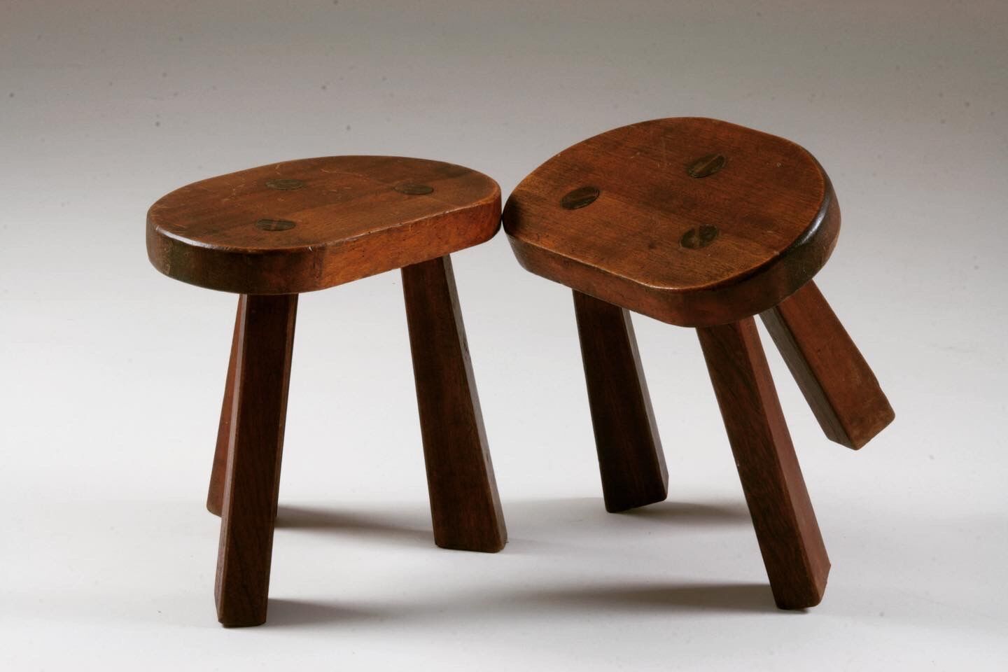 Pair of tripod brutalist stools, France 1950s