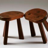 Pair of tripod brutalist stools, France 1950s
