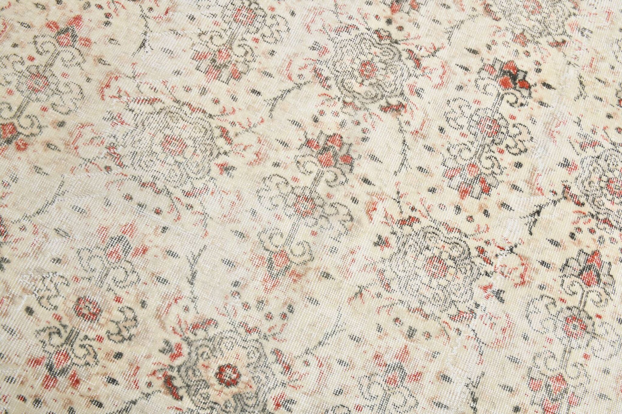 Tapis persan vintage à motif floral