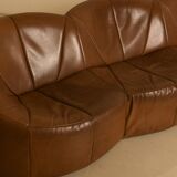 "Pumpkin" 3-seater canapé in patinated brown leather by Pierre Paulin for Arti.