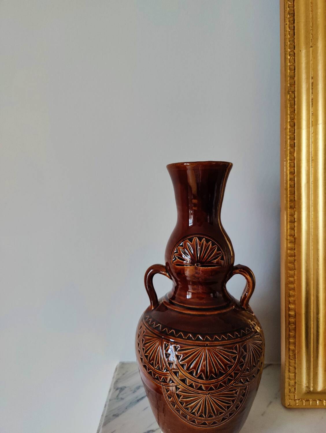 Ceramic vases with rosettes