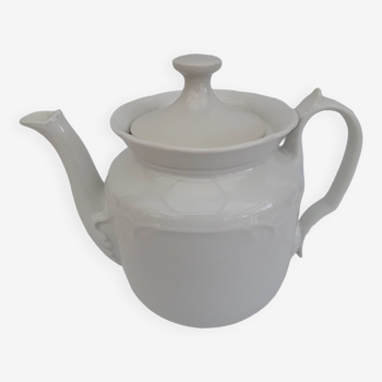 White earthenware teapot