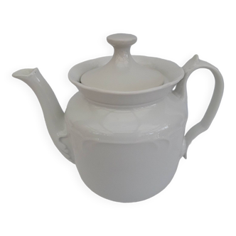 White earthenware teapot