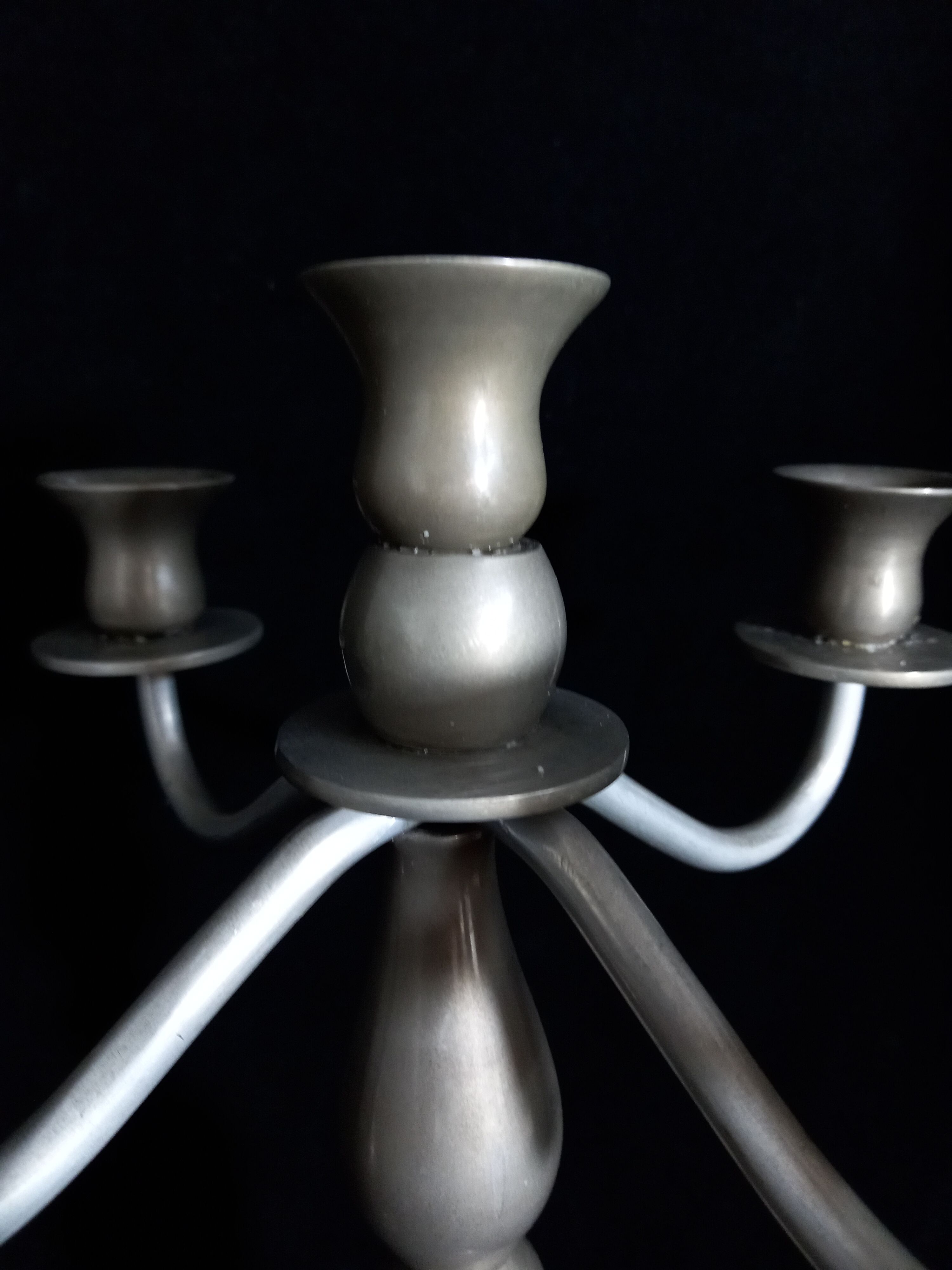 Metal candelabras with five arms