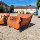 Percival lafer mp-211 sofa set with two armchairs and an ottoman in leather.