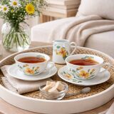 Vintage Pillivuyt tea set, 2 cups, 2 saucers, and milk jug.