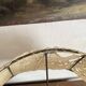 Antique brass lamp with embroidered openwork shade.