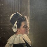 Sign read on cardboard illustrated with two Breton women in costume