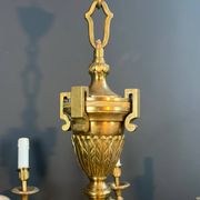 Important bronze chiseled chandelier in Louis XVI style with 8 light arms by Lucien Gau.