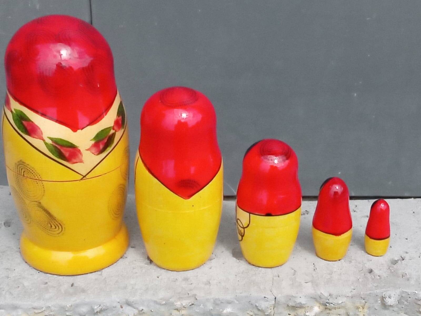 Decorative Russian Matryoshka dolls made of hand-painted wood.