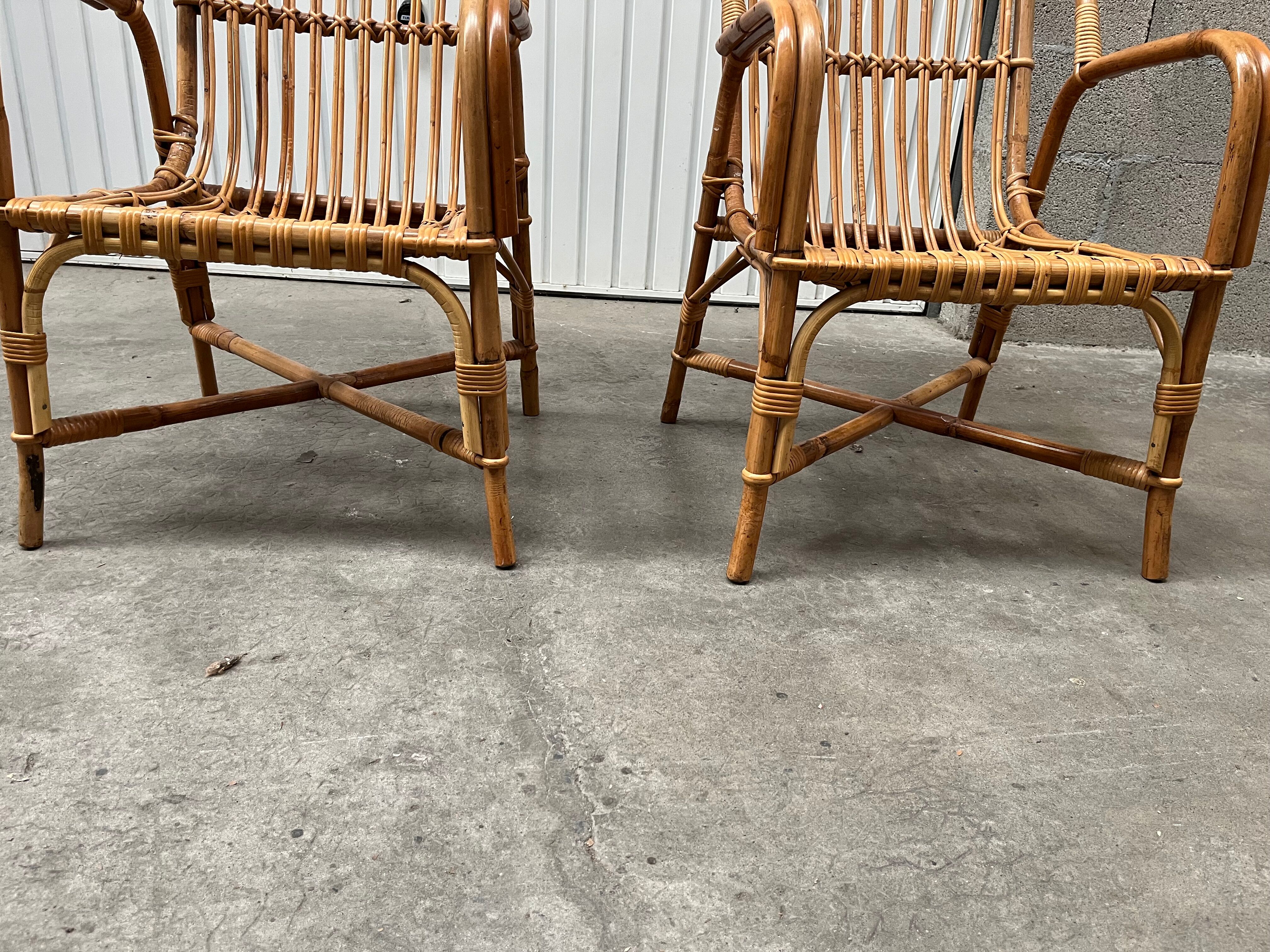 Pair of vintage rattan armchairs from the 70s