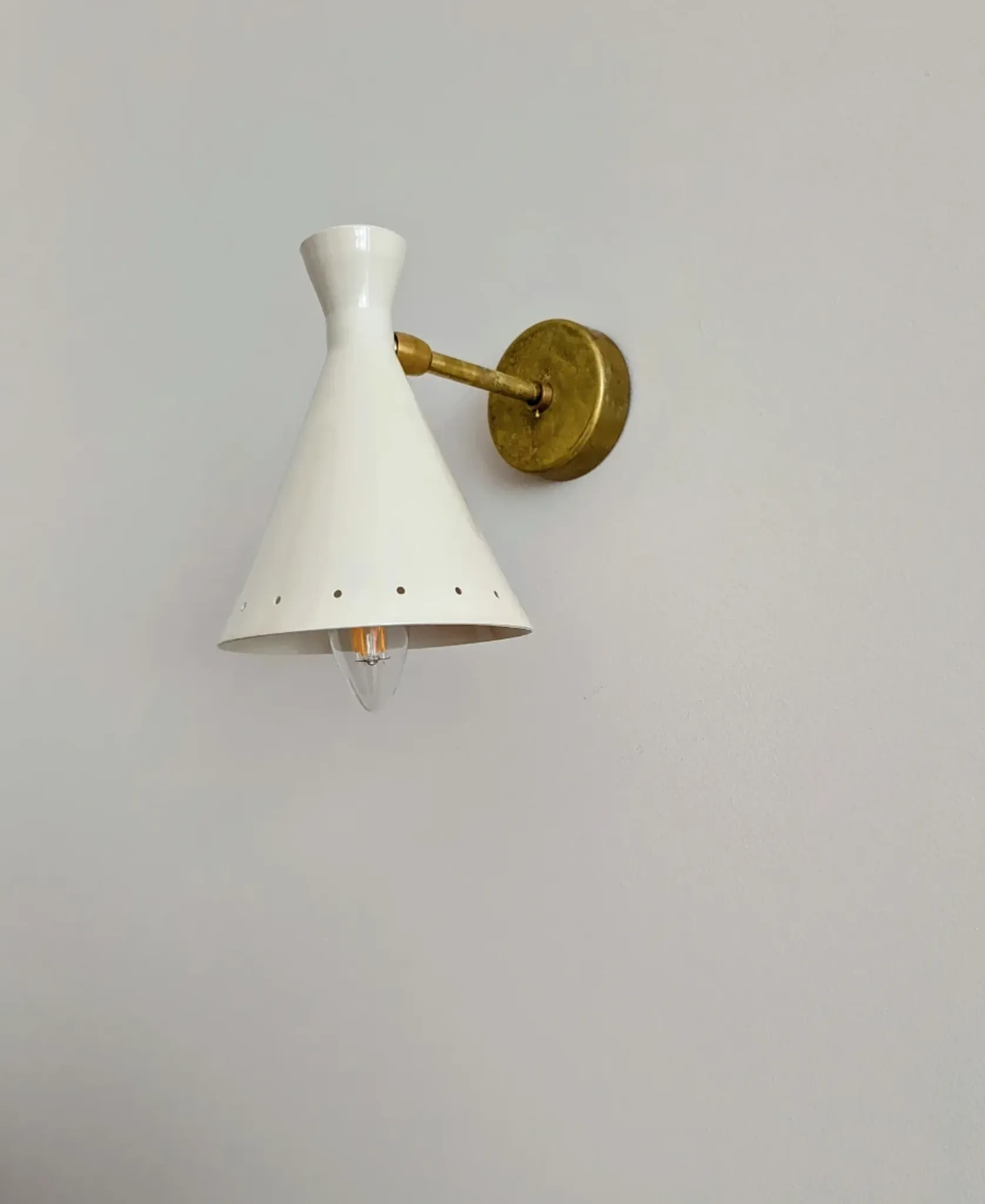 Italian wall light in the style of the 1950s.