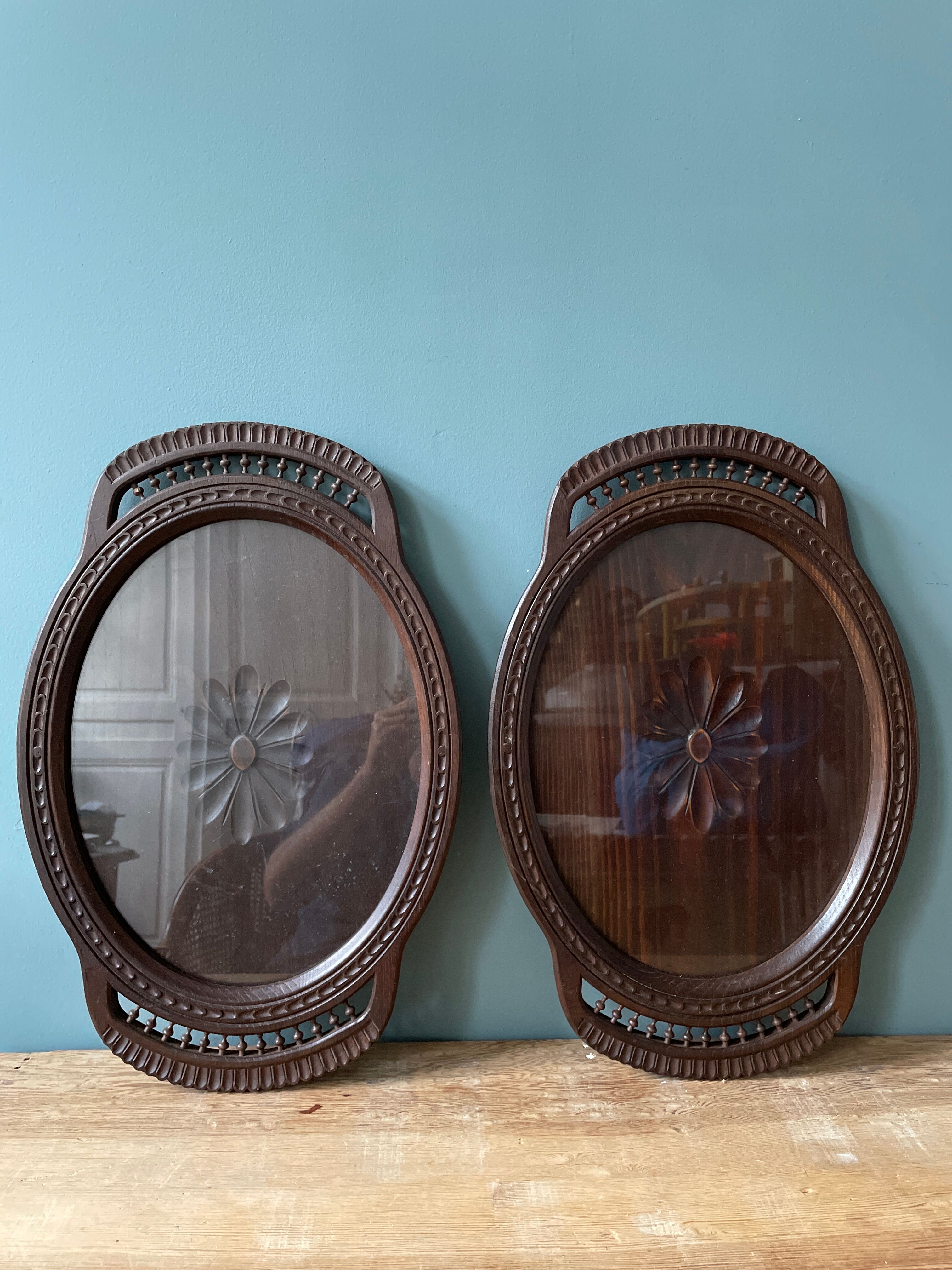 Set of two vintage carved oak service trays