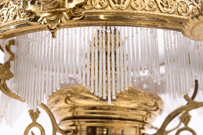 Brass chandelier from the first half of the 20th century.