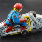 Ancien jouet moto en tôle japonais