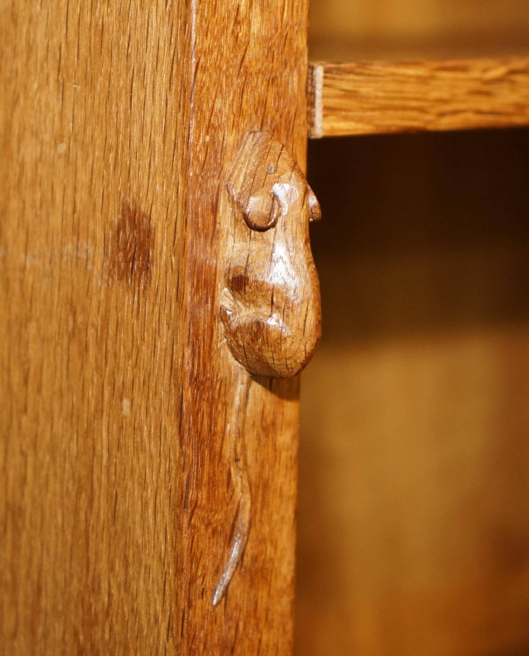 Pair of Robert Mouseman Thompson oak carved bookshelves.