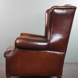 Luxurious large sheep leather wingback armchair with beautiful colors and amazing patina