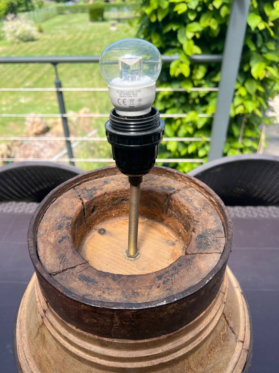 Vintage wooden lamp – base made from a plough wheel hub