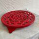 Vintage red Decotec enameled cast iron trivet