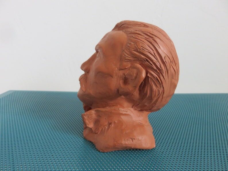 Ancient terracotta bust statue