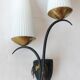 Wall lamp in black metal and gilded brass 1960 with two lights.