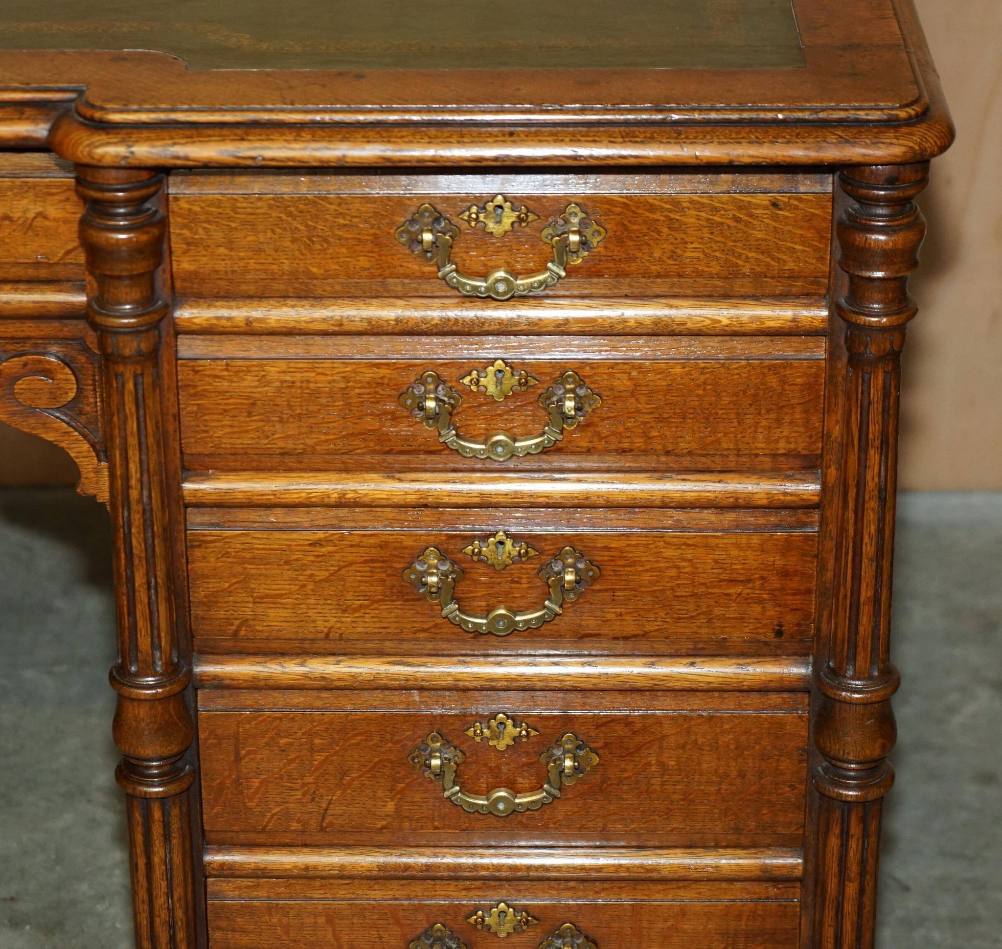 Antique double-sided desk C Hindley & Son in oak and leather