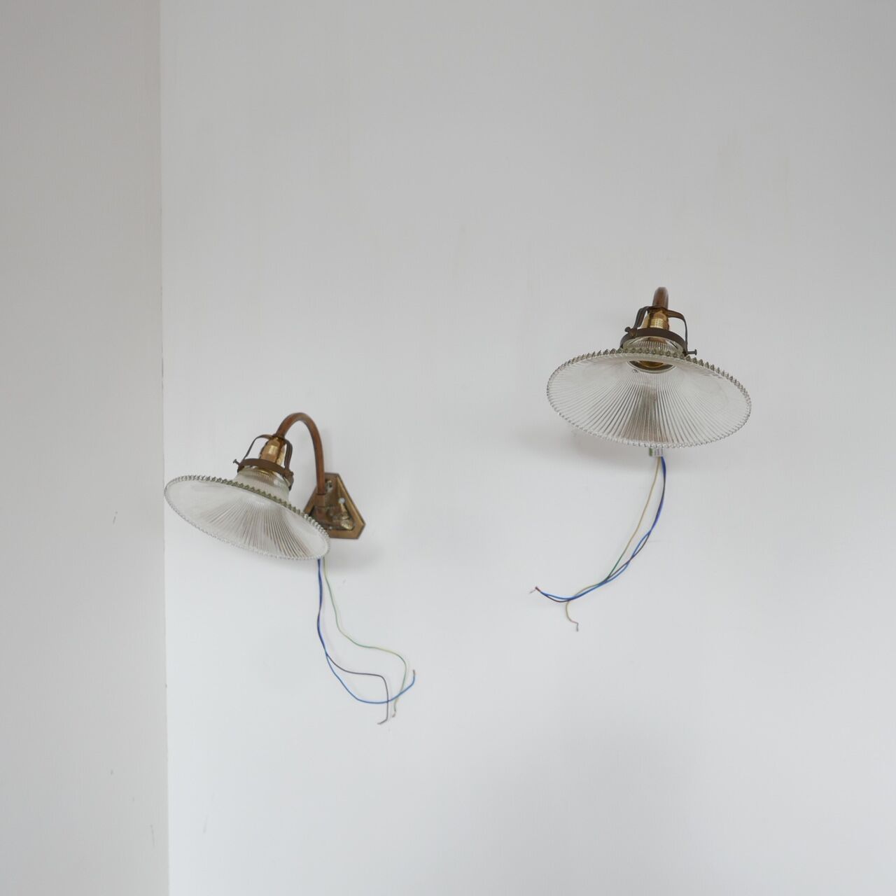 Pair of brass and glass wall sconces