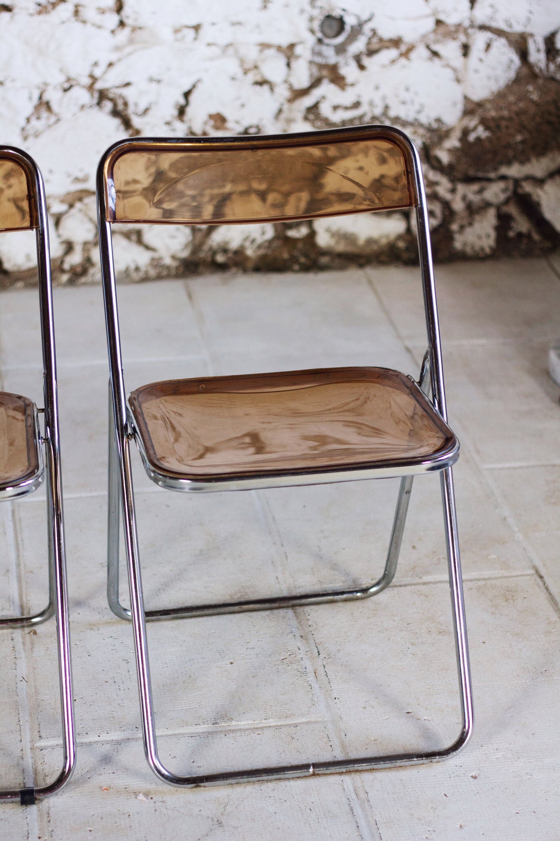 Set of 3 folding chairs in plexiglass and chrome, 1970.