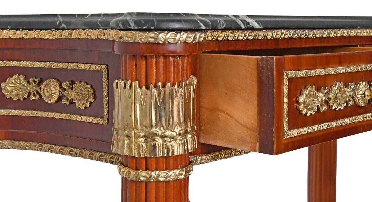 Console topped with an Empire-style mirror.