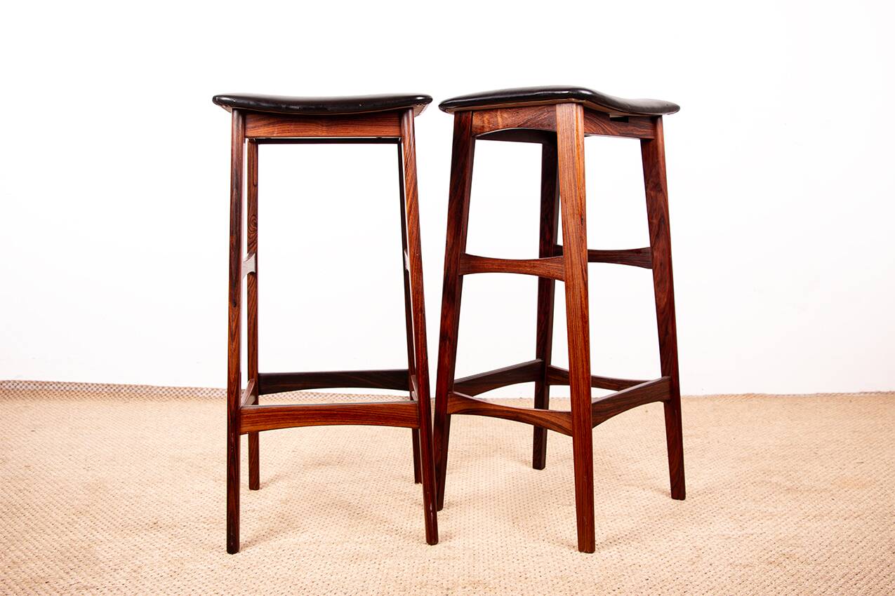 4 Danish high stools, rosewood and black leather, Knud Bent for Dyrlund.