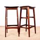 4 Danish high stools, rosewood and black leather, Knud Bent for Dyrlund.