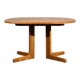 Oval dining table with 2 extensions.