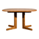 Oval dining table with 2 extensions.