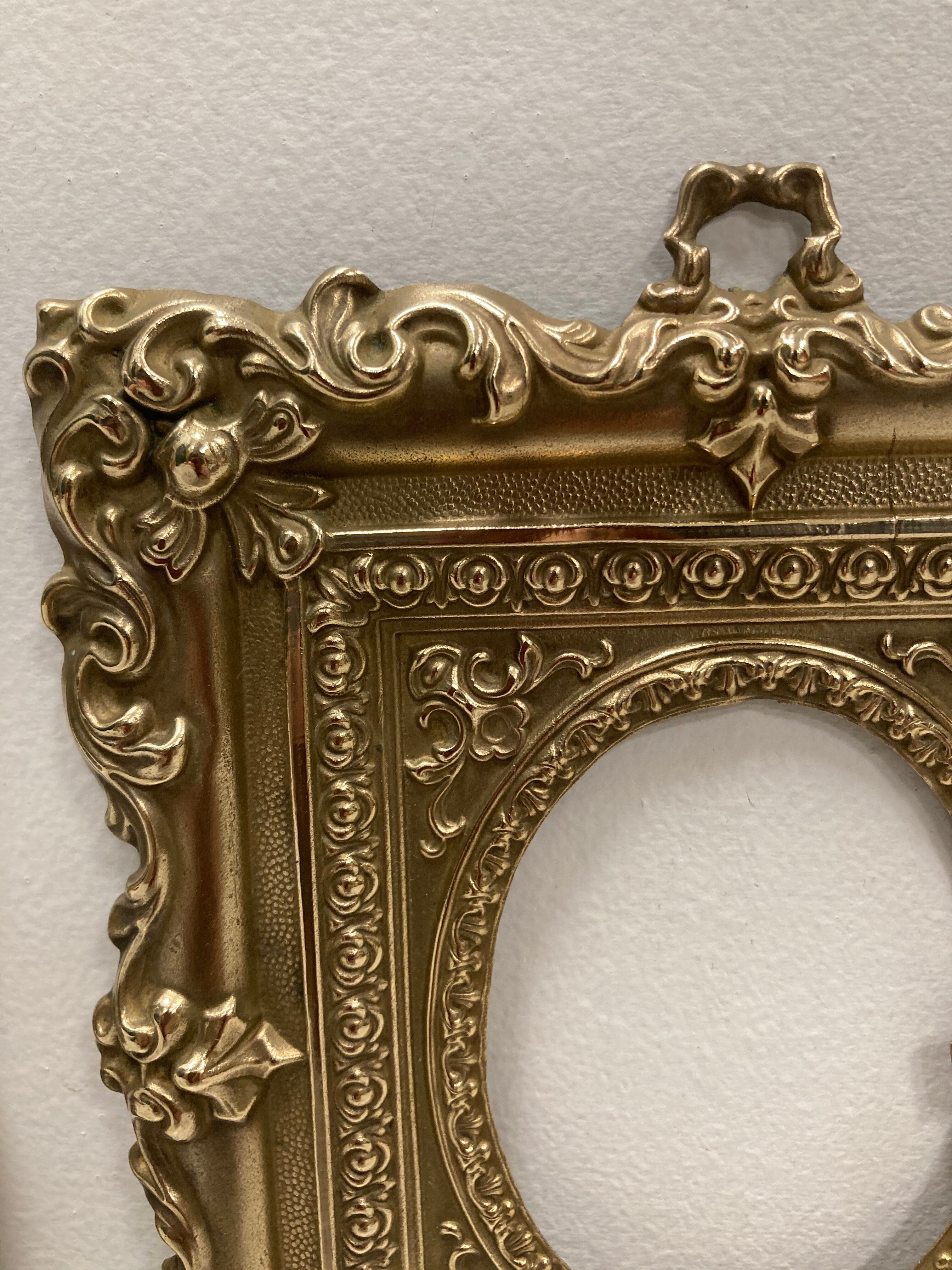 Pair of brass photo frames