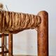 Old wooden and straw bench