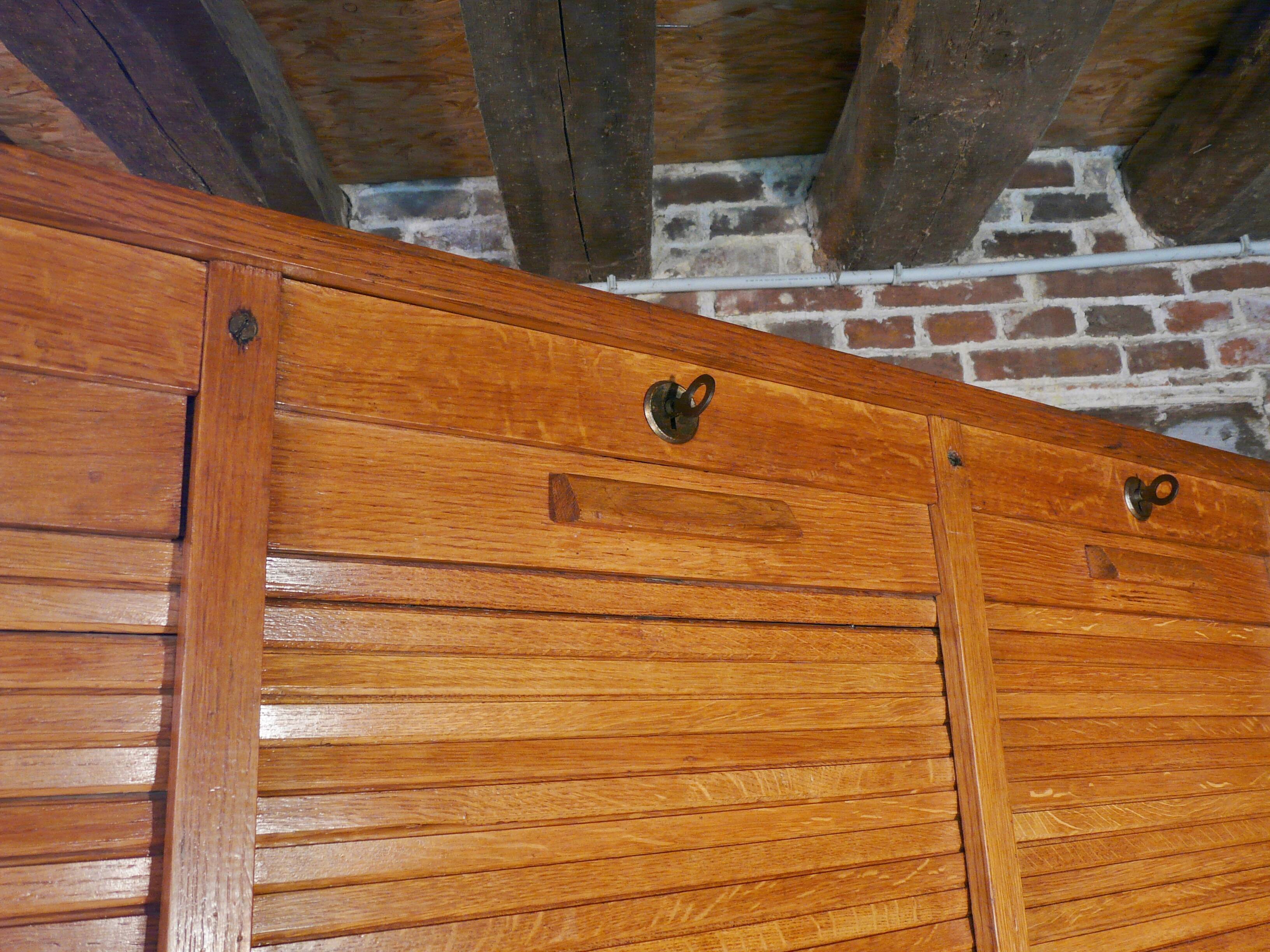 Furniture filing three curtains in oak 50s