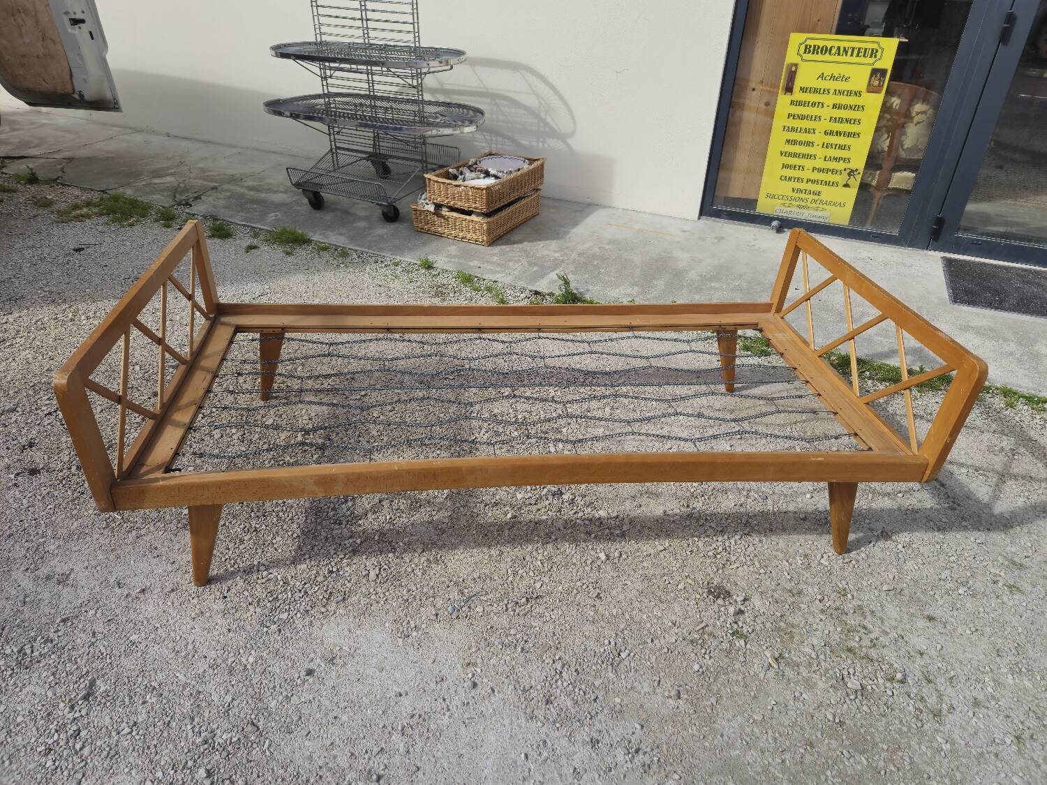 Vintage bed with compass feet from the 1950s