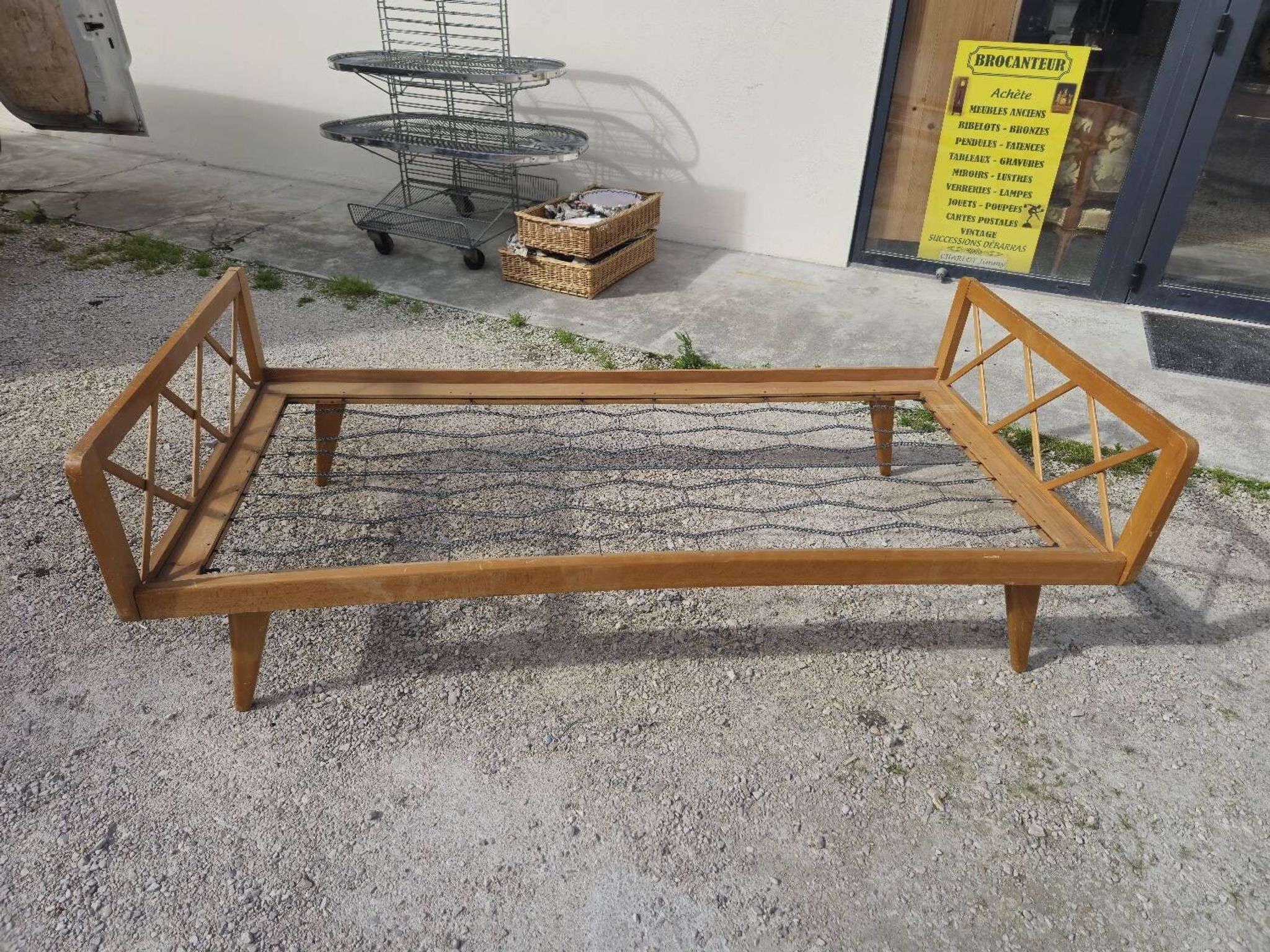 Vintage bed with compass feet from the 1950s