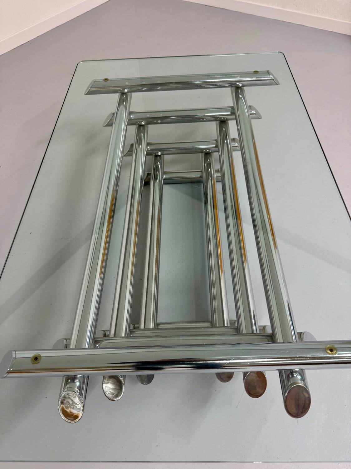 Space coffee table from the 70s, tubular metal and glass, Italian design