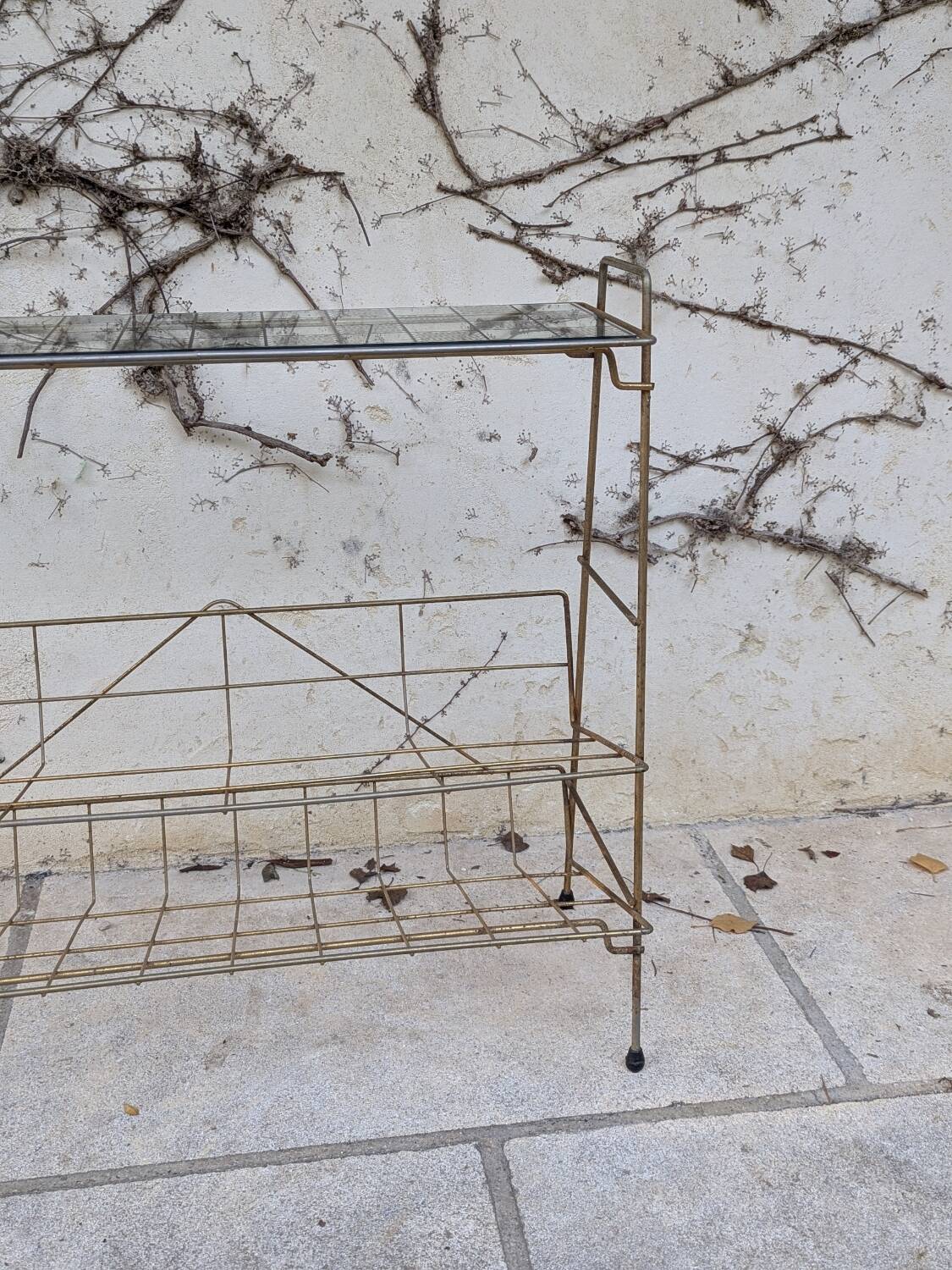 Gold metal magazine rack