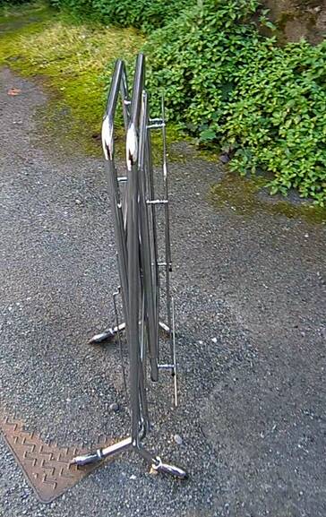 Foldable stainless steel serving trolley with smoked glass tops