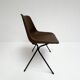 Brown and black set of 6 Polyprop chairs on a metal frame. The Polyprop cha