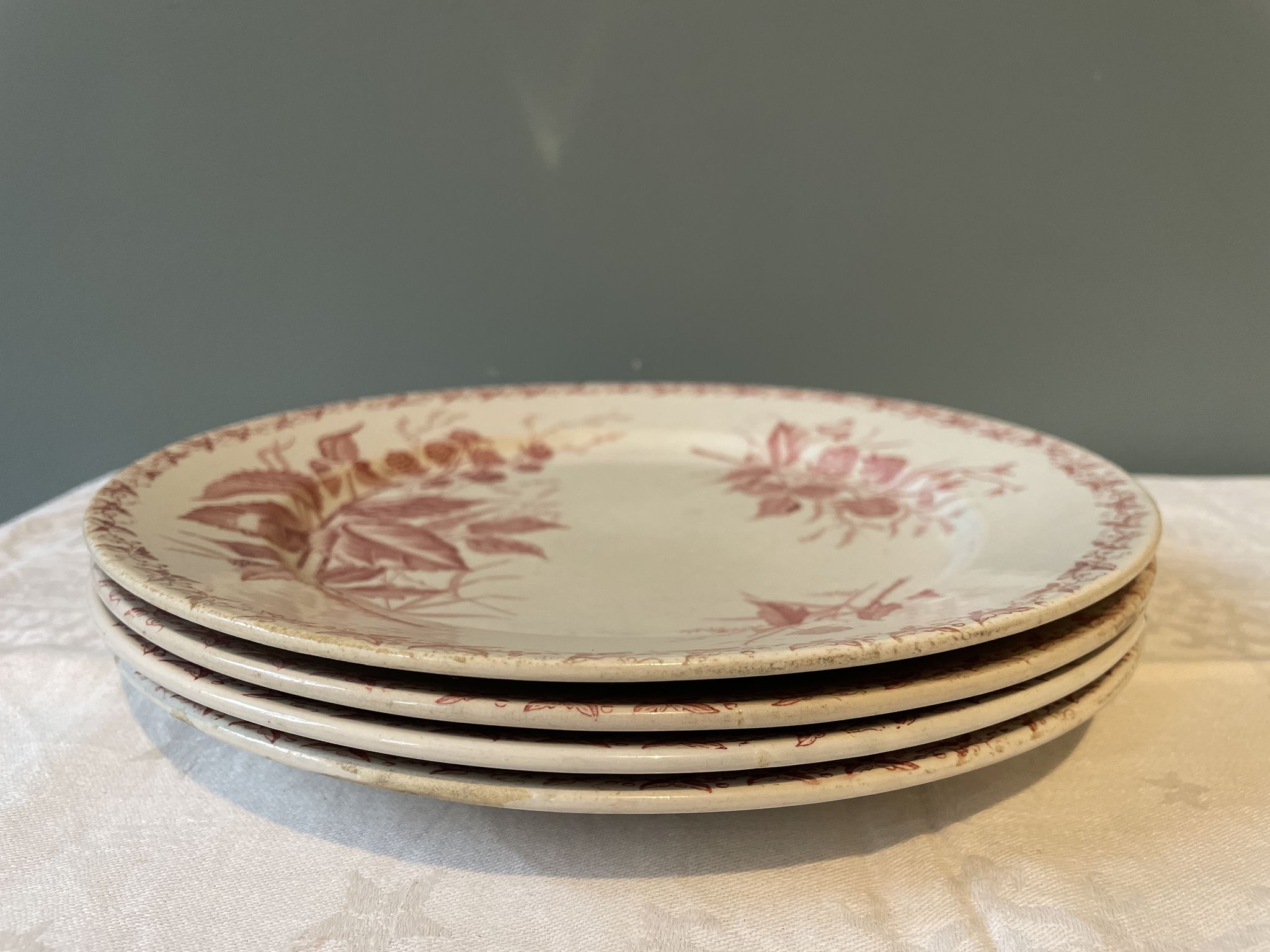 Set of 4 old flat plates Terre de Fer, earthenware of Badonviller