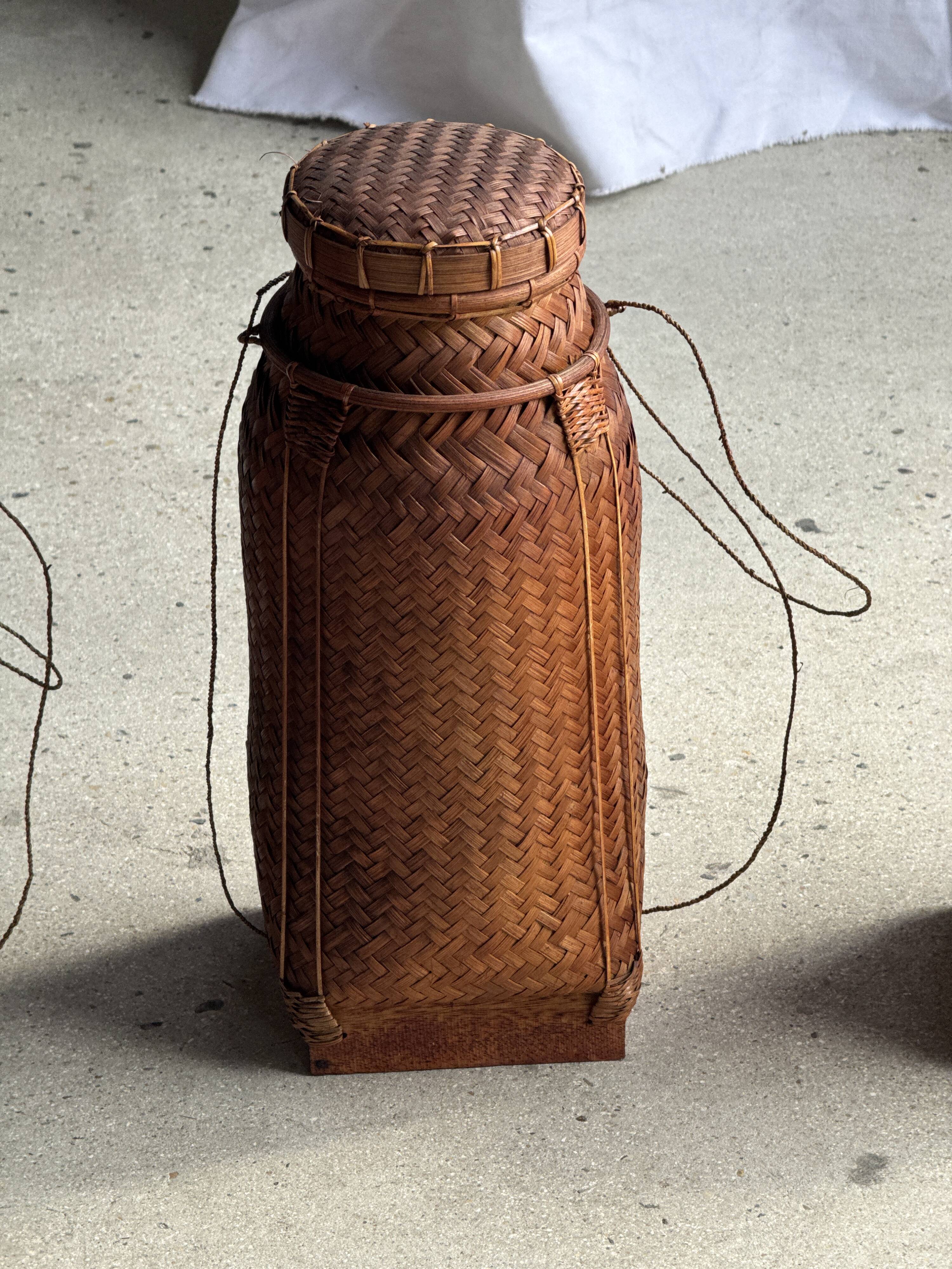 Small traditional Balinese basket with cords H47 D19 0.5kg