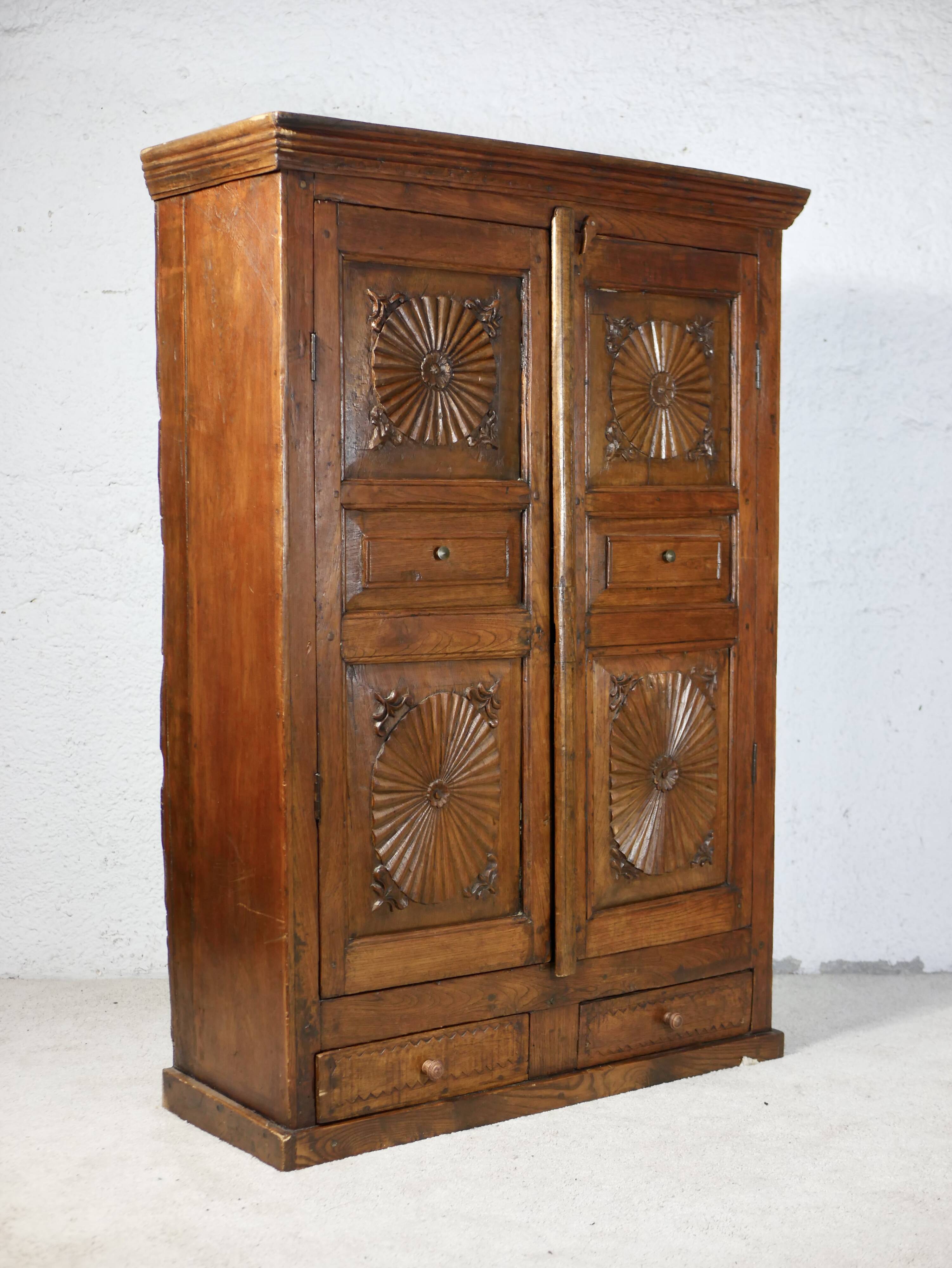 Antique carved wooden cabinet