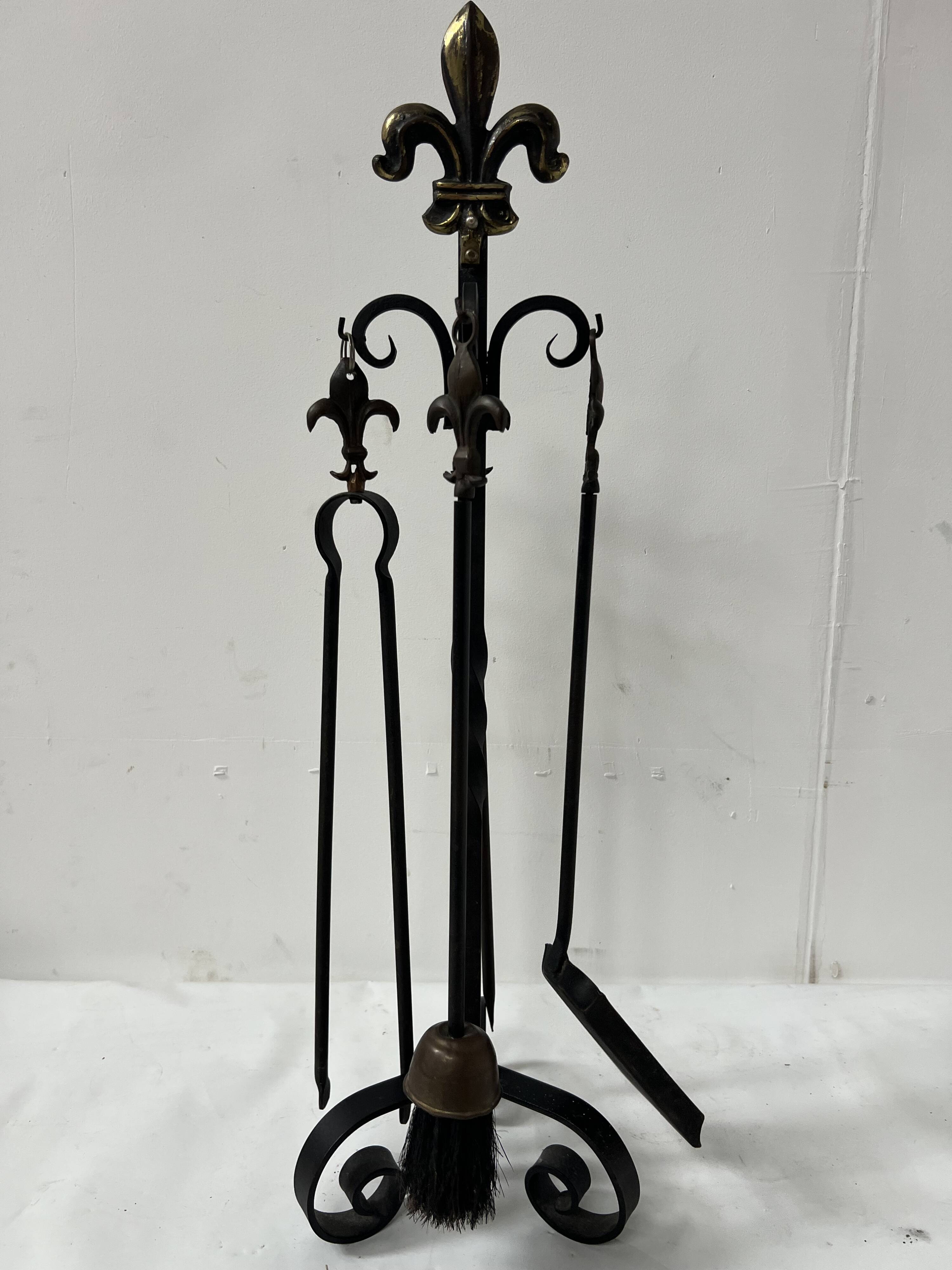 20th century wrought iron and bronze fireplace set
